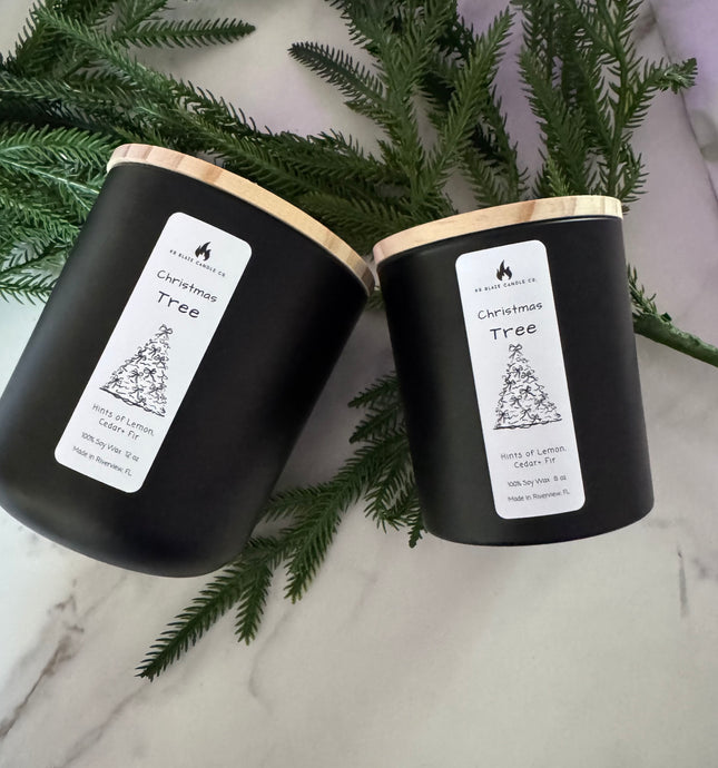 Christmas Tree soy candle with lemon, cedar, and fir notes creating a fresh, evergreen holiday aroma.
