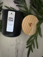 Load image into Gallery viewer, Merry &amp; Bright soy candle with pear, pine and juniper notes creating a fresh and festive holiday aroma.
